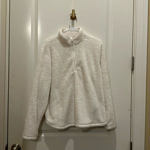 white fur coat half zip